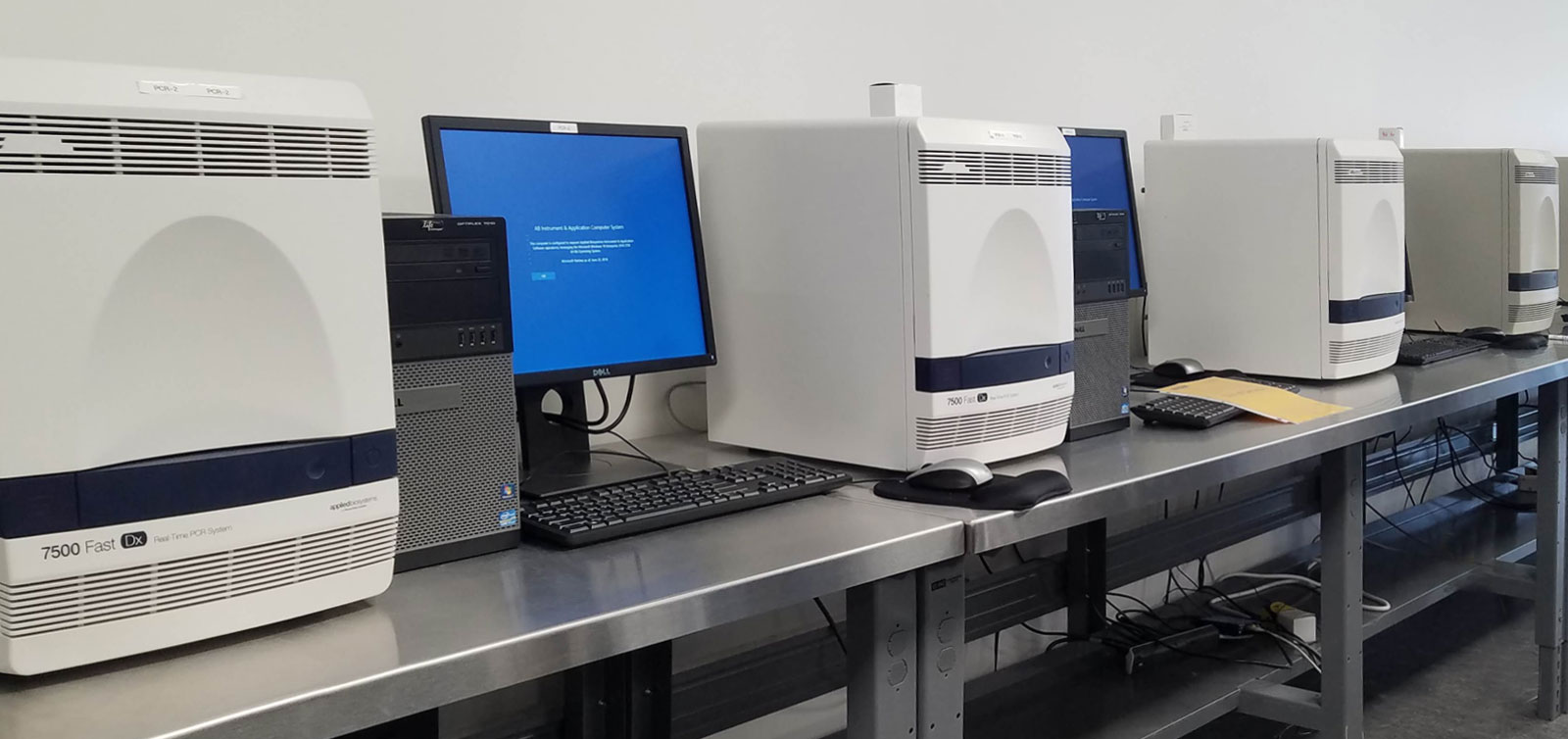 Automated laboratory analytical equipment featuring multiple GC-MS workstations for toxicology, environmental, and forensic testing.